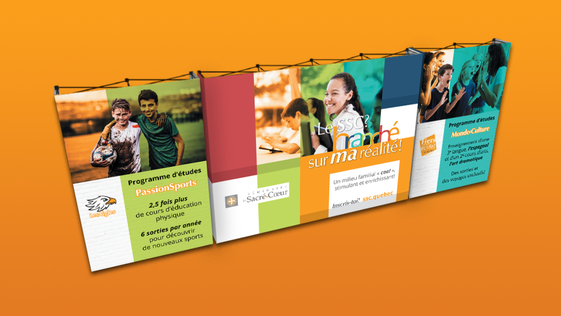 Promotional modular kiosk of the Sacred Heart Seminar presenting the PassionSports and World&Culture programs, with photos of students in sporting, academic, and cultural activities.